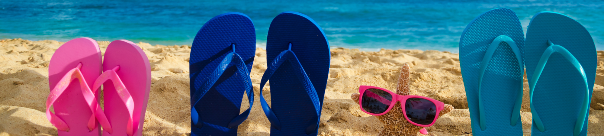 Picture showing flip-flops on a beach