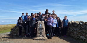 Picture of our students at the top of Whernside Mountain