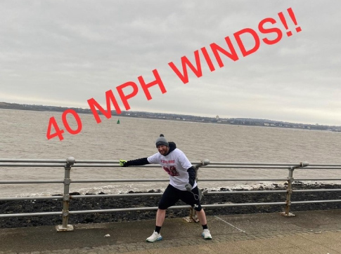 Picture of our tutor, Dave, as he battles 40 mph winds. 