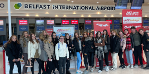 Travel and Tourism students stood in Belfast International Airport.