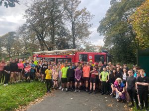 Picture of our students fundraising for Zoe's Place