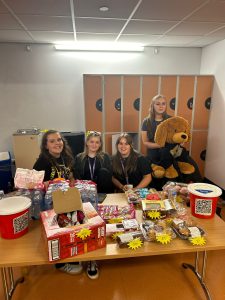 Picture of our students fundraising for Zoe's Place