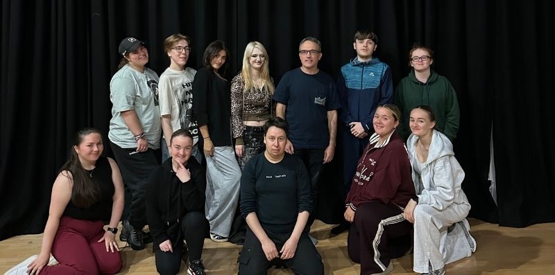 Picture of a group of theatre and performance degree students with artist, Simone Tani