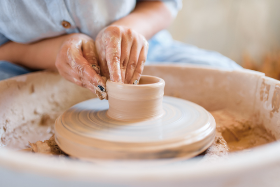 Picture of someone making a ceramic pot