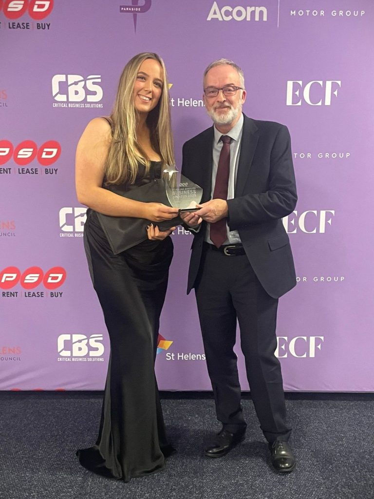 Picture of our student, Mia, with our Principal and CEO, Simon Pierce