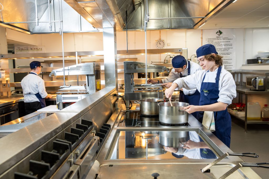 Picture of our students using the new kitchen facilities