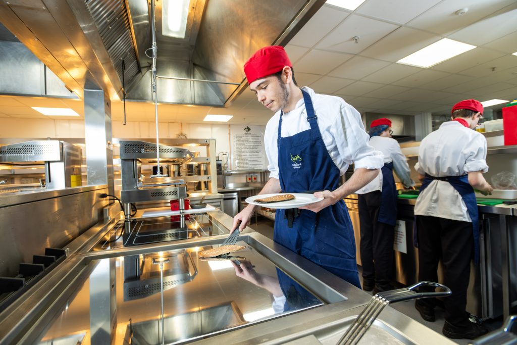Picture of our students using the new kitchen facilities