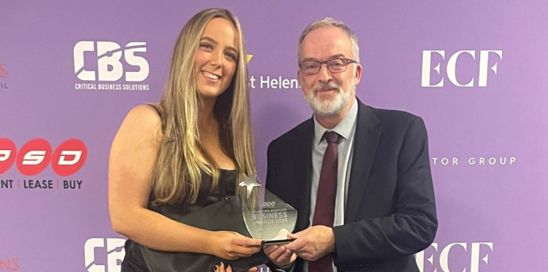 Picture of our student Mia, with our principal Simon