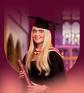 Picture of one of our students in their cap and gown