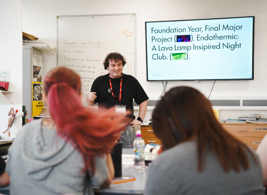 Picture of Tobias talking to our students